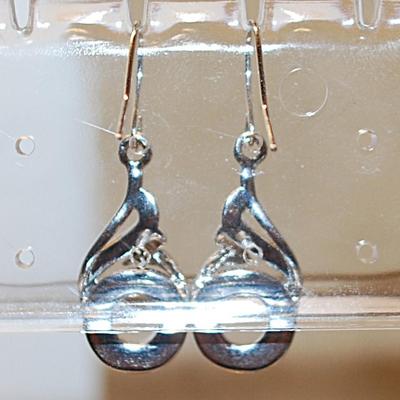 Iridescent Circles Earrings on a Musical Clef Setting (1" x ½") with Wire Hook Clasp
