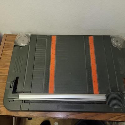 Rotary cutter and storage cabinet on wheels