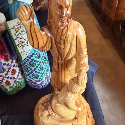 3 religious figures of various sizes