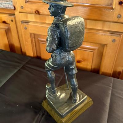 Molded Boy Scout hiking figure on stand