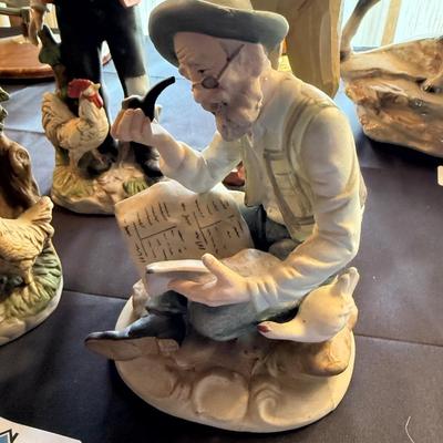 Collection of 4 ceramic figurines
