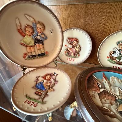 Collection of 8 various Hummel Plates & 1 stand