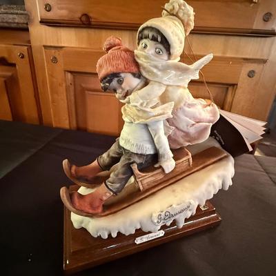 Capodimonte Kids Sledding by G. Armani w/paper tag