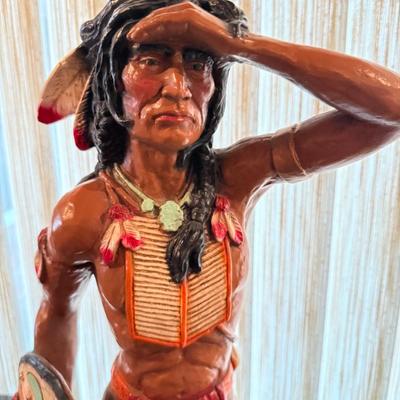 Resin Native American sculpture holding shield 25”t