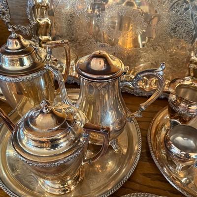 Lot of Silver plated items 5 Trays, 3 Teapots, Sugar & Creamer, cups & serving pcs.