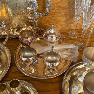 Lot of Silver plated items 5 Trays, 3 Teapots, Sugar & Creamer, cups & serving pcs.