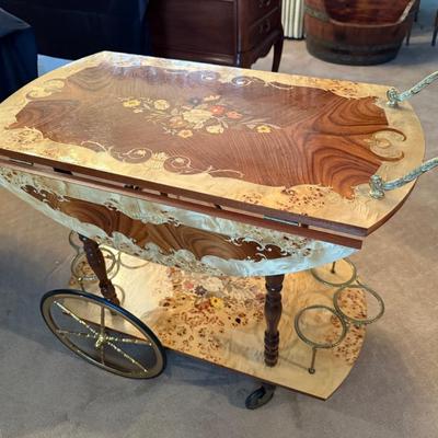 Vintage wood inlaid rolling teacart w/drop sides believe made in Italy