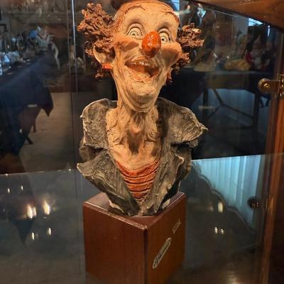 Capodimonte clown on wood base