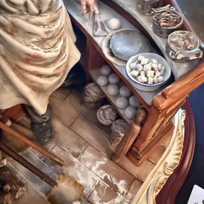 Pizza Maker Capodimonte porcelain piece on wood stand