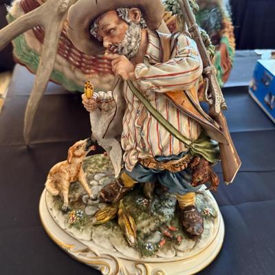 Capodimonte stamped porcelain hunter w/dog & rifle 12”t