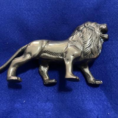 Vintage solid brass roaring lion.