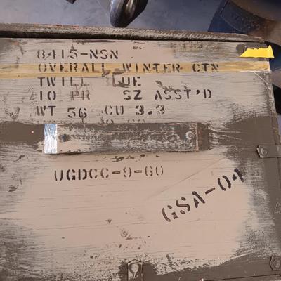 A MILITARY AND METAL TRUNKS