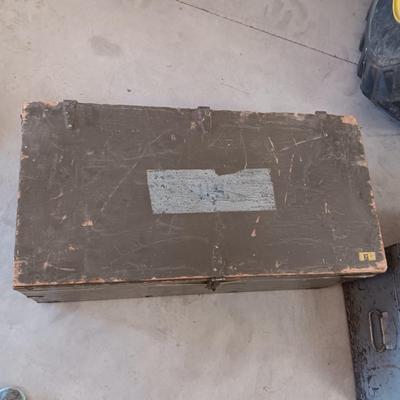 A MILITARY AND METAL TRUNKS