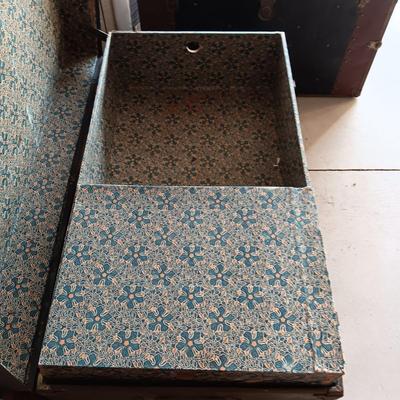 OLD METAL TRUNK WITH A SHELF