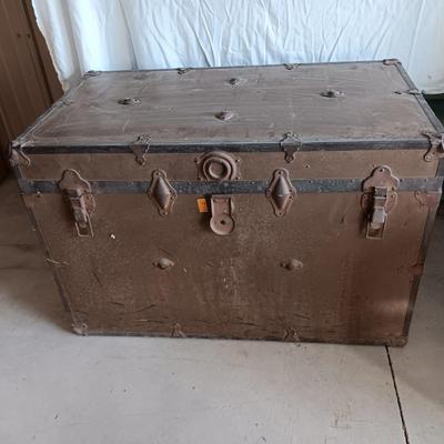 OLD METAL TRUNK WITH A SHELF