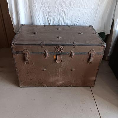 OLD METAL TRUNK WITH A SHELF
