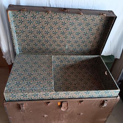 OLD METAL TRUNK WITH A SHELF