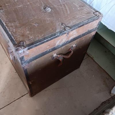 OLD METAL TRUNK WITH A SHELF