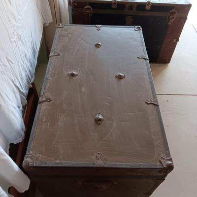 OLD METAL TRUNK WITH A SHELF