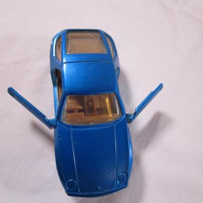 8 toy cars, various brands