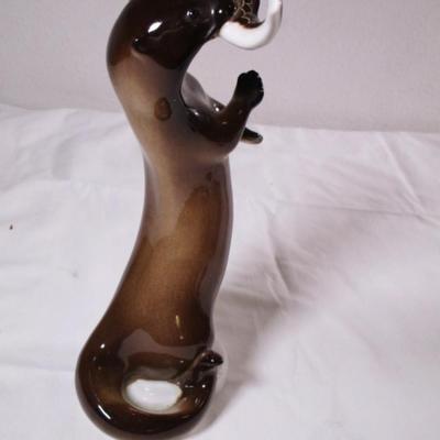 Vintage Lomonosov USSR porcelain Otter with Fish figurine