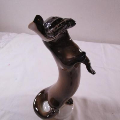 Vintage Lomonosov USSR porcelain Otter with Fish figurine