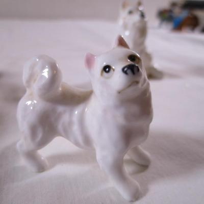 3 porcelain white Husky dogs