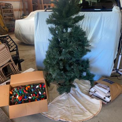 6-1/2’ CHRISTMAS TREE, HUGE BOX OF OLD CHRISTMAS LIGHTS AND A BUNCH OF GIFT BOXES