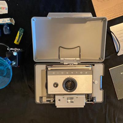 POLAROID AUTOMATIC 103 CAMERA AND ALL OF ITS ACCESSORIES