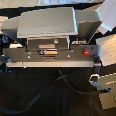 POLAROID AUTOMATIC 103 CAMERA AND ALL OF ITS ACCESSORIES