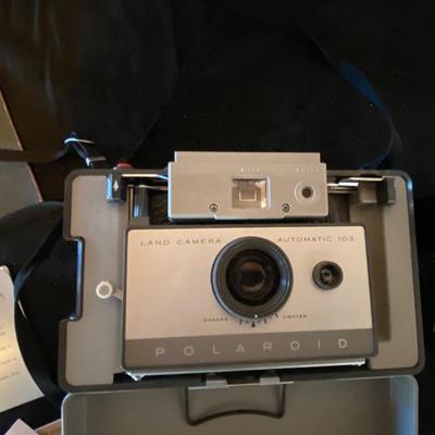 POLAROID AUTOMATIC 103 CAMERA AND ALL OF ITS ACCESSORIES