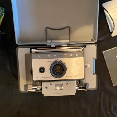POLAROID AUTOMATIC 103 CAMERA AND ALL OF ITS ACCESSORIES