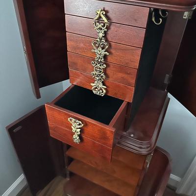 Sale Photo Thumbnail #1529: JEWELRY ARMOIRE 15X15.5X43 & CURIO WALL CABINET