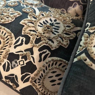 4 NAVY PILLOWS, ONE HAS STAINS ON BOTTOM