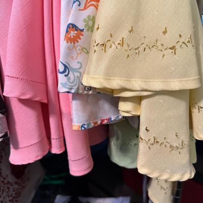 ROLLING CLOTHES RACK, LINENS AS PICTURED