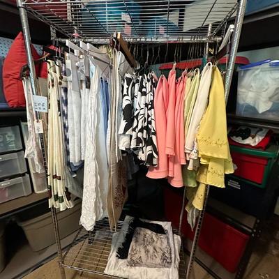 ROLLING CLOTHES RACK, LINENS AS PICTURED