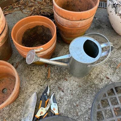 TERRA COTTA, TORCH LIGHT AND PLASTIC PLANTERS AS PICTURED