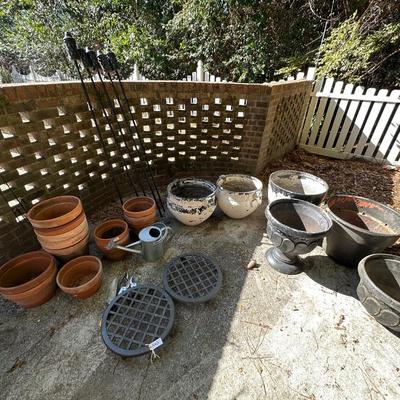 TERRA COTTA, TORCH LIGHT AND PLASTIC PLANTERS AS PICTURED