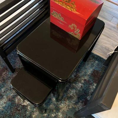 Black lacquered set of two nesting tables 