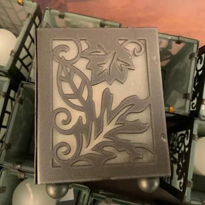 Lot of candles, including a cupcake holder