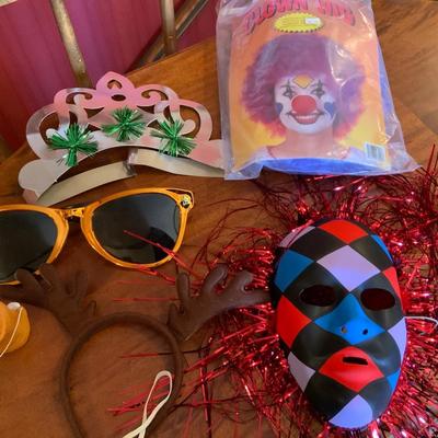 Lot of vintage disguises, including a pair of large glasses.