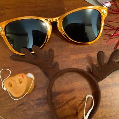 Lot of vintage disguises, including a pair of large glasses.