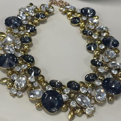 4 Gold tone necklaces