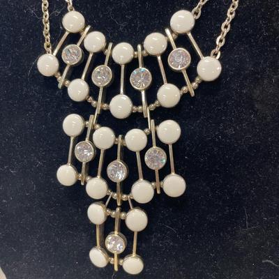 4 Gold tone necklaces
