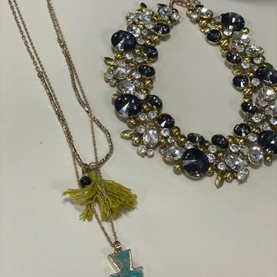 4 Gold tone necklaces