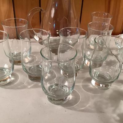 "F" pitcher and 8 glasses, footed, relish lot