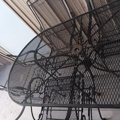 QUALITY WROUGHT IRON MESH PATIO TABLE W/6 ROCKING IRON CHAIRS