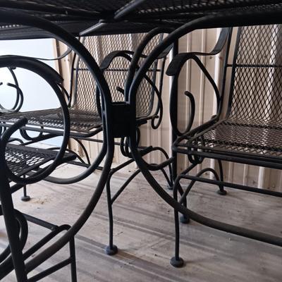 QUALITY WROUGHT IRON MESH PATIO TABLE W/6 ROCKING IRON CHAIRS