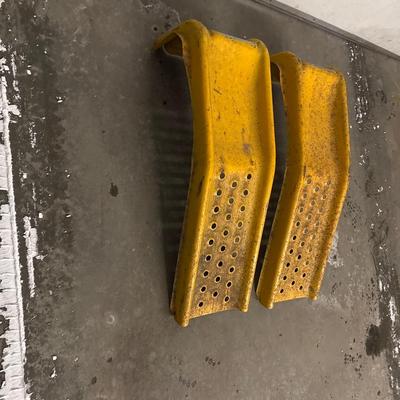 Yellow metal car ramps