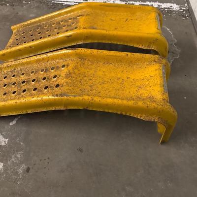 Yellow metal car ramps